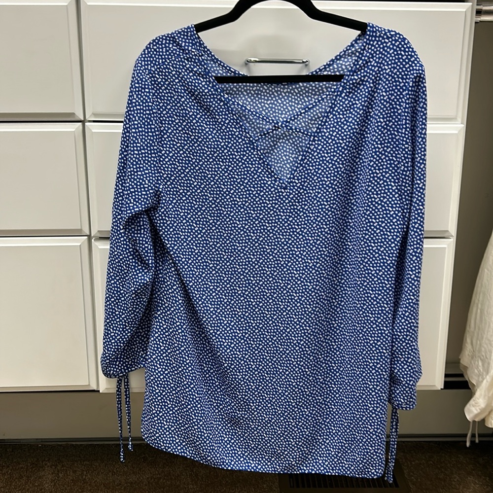 Wantable size large blouse. Blue with white polka dots.